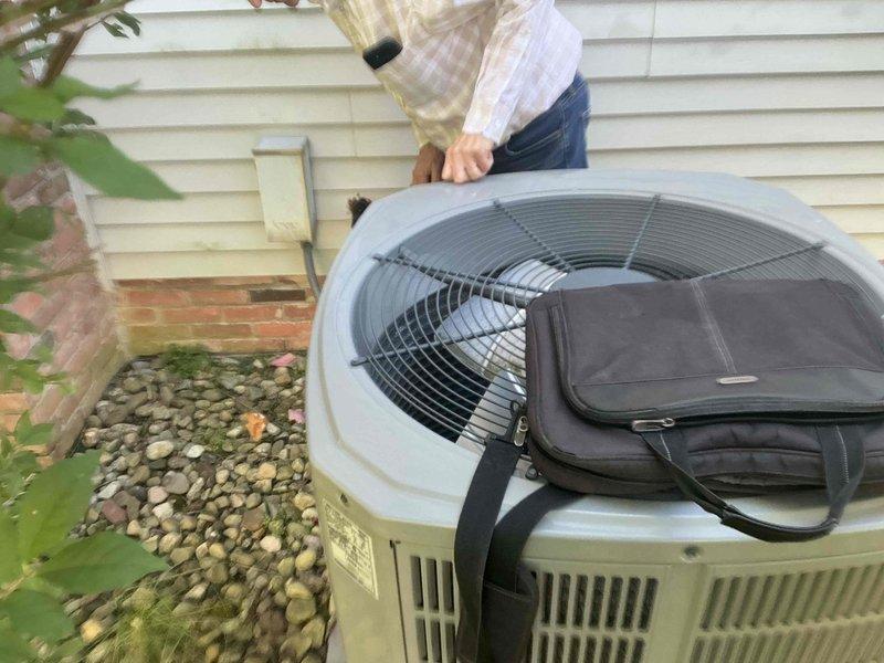 Conducted full system replacement estimate for residential HVAC equipment due to furnace water leak. Assessed existing indoor furnace unit with accessible location and outdoor condensing unit, documented current system configuration, and presented complete replacement options to address the active water leakage issue.