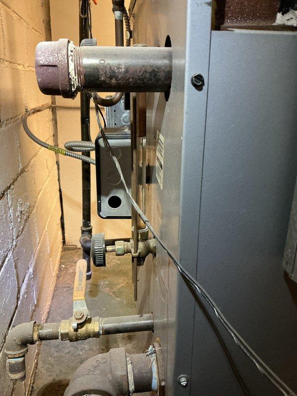 Completed seasonal heating tune-up on residential steam boiler system. Performed comprehensive inspection of boiler unit, associated piping, ventilation components, and HVAC equipment including air handler. Verified proper operation of all system controls, checked combustion efficiency, and confirmed adequate venting through PVC exhaust system. Inspected copper supply lines, condensate drainage, and all mechanical connections for leaks or deterioration. System is operating within normal parameters and ready for heating season.