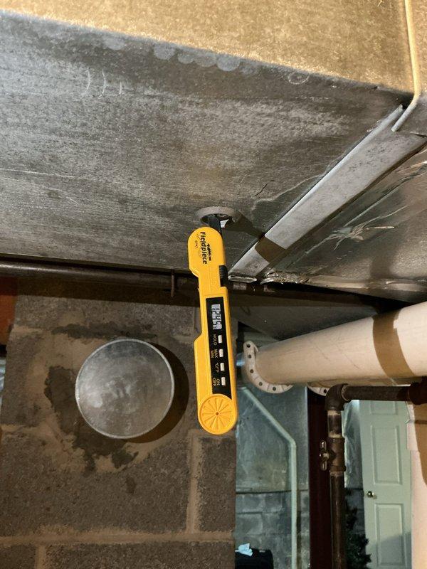 Responded to service call for heating system not maintaining comfortable temperature despite thermostat reaching set point of 70°F. Performed diagnostic testing of HVAC system using calibrated digital instruments to measure system performance and verify proper operation. Inspected furnace components, ductwork, condensate drainage lines, and refrigerant lines in mechanical room. Documented system configuration including PVC drainage piping, copper refrigerant lines with insulation, and air handling equipment. Customer advised that temperature adjustments may be needed and potential system performance concerns were noted for monitoring. Responded to service call for heating system not maintaining comfortable temperature despite thermostat reaching set point of 70°F. Performed diagnostic testing of HVAC system using calibrated digital instruments to measure system performance and verify proper operation. Inspected furnace components, ductwork, condensate drainage lines, and refrigerant lines in mechanical room. Documented system configuration including PVC drainage piping, copper refrigerant lines with insulation, and air handling equipment. Customer advised that temperature adjustments may be needed and potential system performance concerns were noted for monitoring.