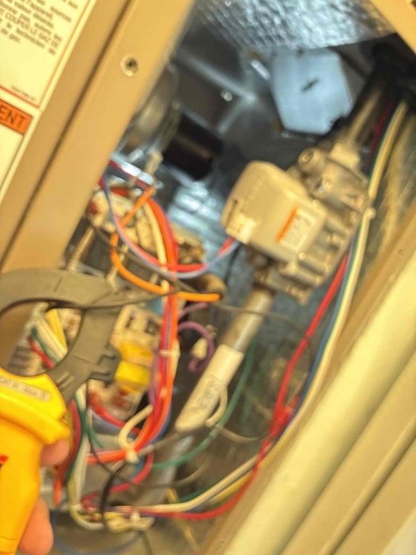 Completed scheduled preventative maintenance on residential furnace system as part of ongoing heating maintenance program. Performed comprehensive inspection of all heating components including blower motor, electrical controls, and circuit board assembly. Utilized multimeter to verify proper voltage and electrical connections throughout the system. Inspected and tested capacitor, verified all wire connections were secure, and confirmed control board functionality. All components found to be operating within normal parameters with no issues identified. Completed scheduled preventative maintenance on residential furnace system as part of ongoing heating maintenance program. Performed comprehensive inspection of all heating components including blower motor, electrical controls, and circuit board assembly. Utilized multimeter to verify proper voltage and electrical connections throughout the system. Inspected and tested capacitor, verified all wire connections were secure, and confirmed control board functionality. All components found to be operating within normal parameters with no issues identified.
