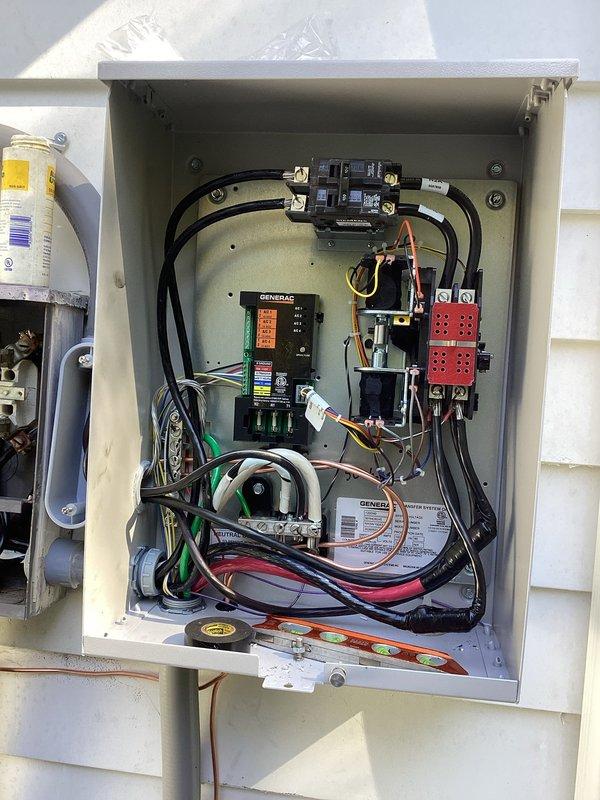 Completed full installation of 26kW Generac residential backup generator system. Installed generator unit on dedicated concrete pad with proper clearances from structure and HVAC equipment. Ran exterior conduit along building facade with secure mounting brackets to house electrical and gas connections. Installed and wired Generac transfer switch panel with control module, circuit breakers, and proper bus bar connections. Connected all required power conductors and established grounding per NEC requirements. Completed natural gas line installation from utility connection to generator fuel inlet. All electrical and gas line work performed in accordance with applicable building codes and manufacturer specifications. System includes standard 5-year engine warranty, 3-year parts warranty, and 2-year labor warranty. Verified proper installation alignment, tested all electrical connections, and confirmed system readiness for operation. Completed full installation of 26kW Generac residential backup generator system. Installed generator unit on dedicated concrete pad with proper clearances from structure and HVAC equipment. Ran exterior conduit along building facade with secure mounting brackets to house electrical and gas connections. Installed and wired Generac transfer switch panel with control module, circuit breakers, and proper bus bar connections. Connected all required power conductors and established grounding per NEC requirements. Completed natural gas line installation from utility connection to generator fuel inlet. All electrical and gas line work performed in accordance with applicable building codes and manufacturer specifications. System includes standard 5-year engine warranty, 3-year parts warranty, and 2-year labor warranty. Verified proper installation alignment, tested all electrical connections, and confirmed system readiness for operation.