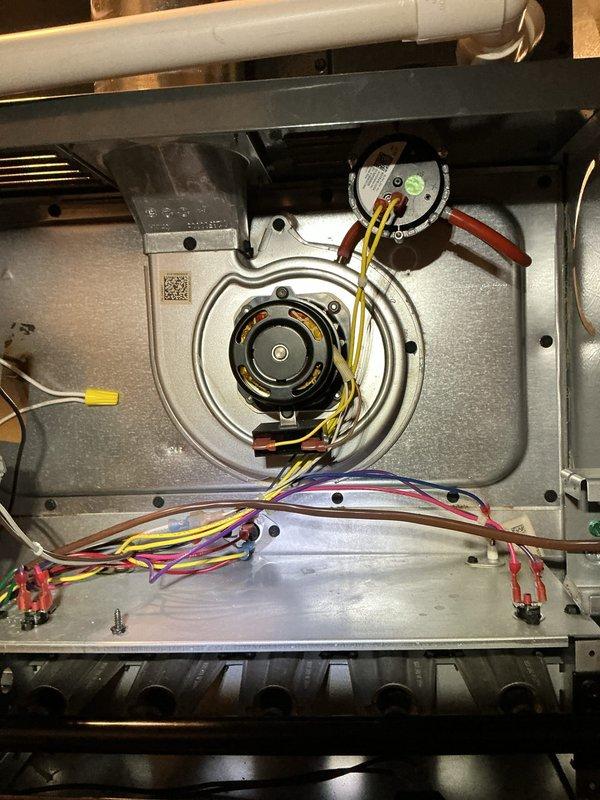 Completed comprehensive heating maintenance on residential furnace system as part of recurring maintenance program. Performed thorough inspection of blower motor assembly, pressure switch, and all electrical connections within the furnace housing. Verified proper operation of integrated Aprilaire whole-house humidifier unit mounted on furnace plenum, confirmed electrical connections secure, and ensured all ductwork seals intact. All system components found in proper working condition with organized wiring and secure mechanical installations. Completed comprehensive heating maintenance on residential furnace system as part of recurring maintenance program. Performed thorough inspection of blower motor assembly, pressure switch, and all electrical connections within the furnace housing. Verified proper operation of integrated Aprilaire whole-house humidifier unit mounted on furnace plenum, confirmed electrical connections secure, and ensured all ductwork seals intact. All system components found in proper working condition with organized wiring and secure mechanical installations.