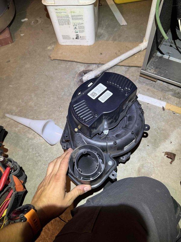 Responded to service call for furnace displaying induction fan motor warning. Performed diagnostic inspection of heating system and heat pump as requested. Removed and examined induction motor assembly, which showed signs of wear and operational issues. Disassembled furnace cabinet to access internal components including heat exchanger, blower assembly, and control wiring. Inspected blower motor, fan wheel, and associated electrical connections. Documented equipment condition with photos for service records. Removed faulty induction motor for replacement and verified all internal components were accessible for servicing. Responded to service call for furnace displaying induction fan motor warning. Performed diagnostic inspection of heating system and heat pump as requested. Removed and examined induction motor assembly, which showed signs of wear and operational issues. Disassembled furnace cabinet to access internal components including heat exchanger, blower assembly, and control wiring. Inspected blower motor, fan wheel, and associated electrical connections. Documented equipment condition with photos for service records. Removed faulty induction motor for replacement and verified all internal components were accessible for servicing.