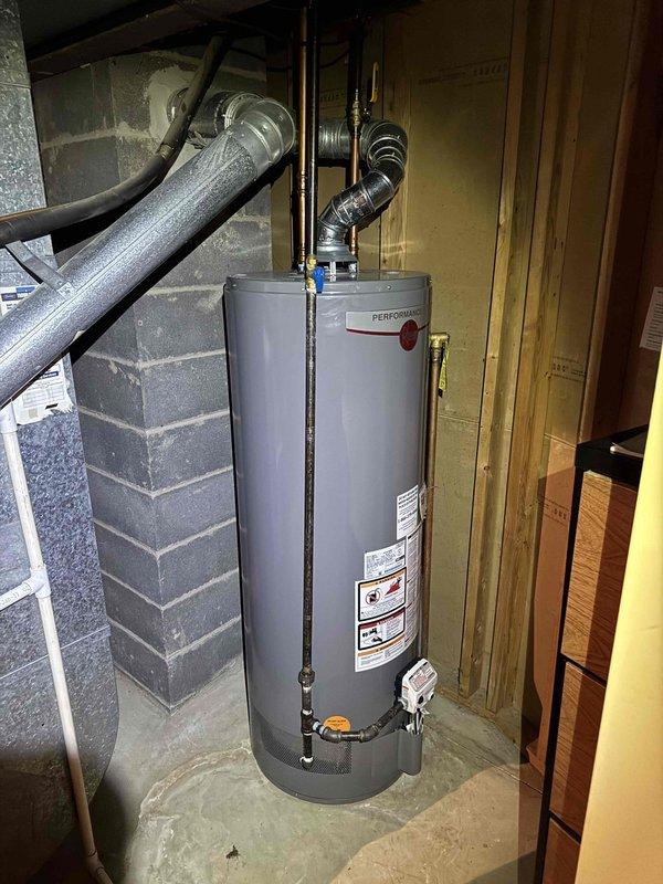 Completed comprehensive heating maintenance visit on residential furnace system as part of ongoing preventive maintenance program. Performed thorough inspection of gas furnace unit, including visual examination of all components, burner assembly, heat exchanger, and safety controls. Verified proper operation of blower motor and checked all electrical connections for signs of wear or damage.
Measured supply air temperature at ductwork, recording reading of 52.8°F, indicating system was not in heating mode during inspection. Inspected ductwork connections and plenum for proper sealing and structural integrity. Examined venting system and flue pipe connections to ensure safe exhaust of combustion gases. Checked gas supply line connections and verified proper operation of gas valve.
Inspected water heater installation in utility area, noting Performance brand unit with proper plumbing connections, gas line installation, and safety features in place. Verified blue-handled isolation valves Completed comprehensive heating maintenance visit on residential furnace system as part of ongoing preventive maintenance program. Performed thorough inspection of gas furnace unit, including visual examination of all components, burner assembly, heat exchanger, and safety controls. Verified proper operation of blower motor and checked all electrical connections for signs of wear or damage.
Measured supply air temperature at ductwork, recording reading of 52.8°F, indicating system was not in heating mode during inspection. Inspected ductwork connections and plenum for proper sealing and structural integrity. Examined venting system and flue pipe connections to ensure safe exhaust of combustion gases. Checked gas supply line connections and verified proper operation of gas valve.
Inspected water heater installation in utility area, noting Performance brand unit with proper plumbing connections, gas line installation, and safety features in place. Verified blue-handled isolation valves