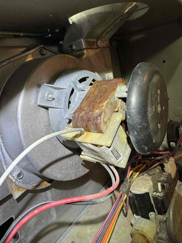 # HVAC Heating Maintenance Service
Completed comprehensive preventive maintenance on residential forced-air furnace system as part of ongoing maintenance program. Performed thorough inspection of heat exchanger assembly, burner tubes, and blower motor components. Burner tubes showed moderate dust accumulation consistent with normal operation and were cleaned as needed. Heat exchanger surfaces displayed condensation droplets, indicating proper combustion and venting function.
Inspected blower motor assembly including capacitor, mounting hardware, and electrical connections. Noted rust discoloration present on motor mounting bracket, which was documented for monitoring but does not currently affect system operation. Verified all wire connections including red, pink, yellow, and white control wires are secure and properly routed. Blower wheel exhibited typical dust buildup and was cleaned to maintain optimal airflow efficiency.
Assessed overall system condition and confirmed all mechan # HVAC Heating Maintenance Service
Completed comprehensive preventive maintenance on residential forced-air furnace system as part of ongoing maintenance program. Performed thorough inspection of heat exchanger assembly, burner tubes, and blower motor components. Burner tubes showed moderate dust accumulation consistent with normal operation and were cleaned as needed. Heat exchanger surfaces displayed condensation droplets, indicating proper combustion and venting function.
Inspected blower motor assembly including capacitor, mounting hardware, and electrical connections. Noted rust discoloration present on motor mounting bracket, which was documented for monitoring but does not currently affect system operation. Verified all wire connections including red, pink, yellow, and white control wires are secure and properly routed. Blower wheel exhibited typical dust buildup and was cleaned to maintain optimal airflow efficiency.
Assessed overall system condition and confirmed all mechan