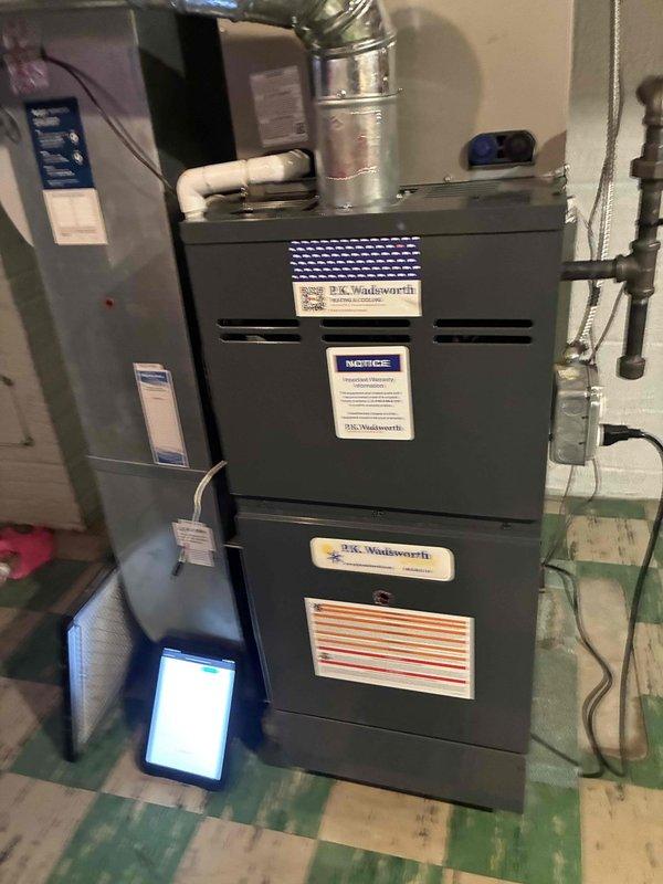 Completed scheduled preventive maintenance on Nortek furnace system as part of ongoing recurring service plan. Performed comprehensive heating system inspection, verified burner ignition and flame characteristics showing proper combustion with orange flame pattern visible through observation port, confirmed all electrical connections and control wiring secure at board terminals, and documented system operation through photographic records. All heating components found operating within normal parameters with no deficiencies requiring immediate attention.