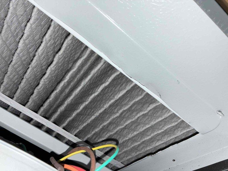 Completed scheduled heating system maintenance as part of ongoing service plan. Inspected furnace components and identified heavily soiled air filter with significant dust and debris accumulation throughout the pleated media, indicating extended use without replacement. Documented filter condition showing complete discoloration and clogging that would restrict airflow and reduce system efficiency. Verified electrical connections and capacitor during inspection, with all wiring observed to be properly secured within the air handler cabinet. Completed scheduled heating system maintenance as part of ongoing service plan. Inspected furnace components and identified heavily soiled air filter with significant dust and debris accumulation throughout the pleated media, indicating extended use without replacement. Documented filter condition showing complete discoloration and clogging that would restrict airflow and reduce system efficiency. Verified electrical connections and capacitor during inspection, with all wiring observed to be properly secured within the air handler cabinet.