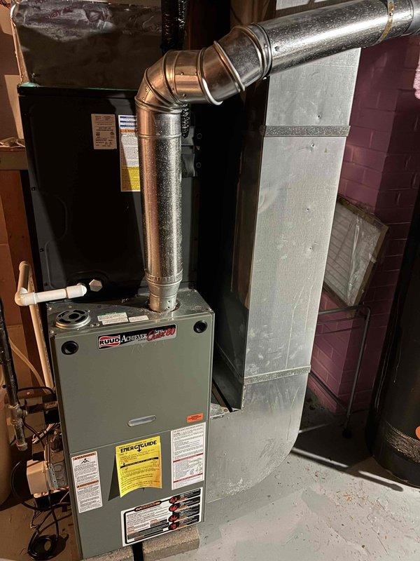 Completed preventive maintenance service on residential Ruud furnace system and associated Premier dehumidifier unit. Performed comprehensive heating system inspection including visual assessment of furnace cabinet, ductwork connections, copper refrigerant lines, and exhaust venting. Verified proper operation of dehumidifier unit installed in attic space with insulation integrity confirmed. All equipment found operating within manufacturer specifications with no immediate service needs identified.