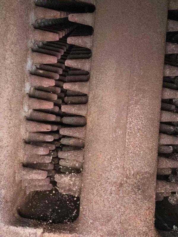 Responded to no-heat call where boiler was not communicating with thermostat. Upon inspection, found heat exchanger exhibiting severe corrosion and oxidation throughout the coil assembly, with heavy rust buildup on burner components and metal fins. Documented extensive deterioration of internal components including mineral deposits and environmental damage indicating systemic aging of the unit. Responded to no-heat call where boiler was not communicating with thermostat. Upon inspection, found heat exchanger exhibiting severe corrosion and oxidation throughout the coil assembly, with heavy rust buildup on burner components and metal fins. Documented extensive deterioration of internal components including mineral deposits and environmental damage indicating systemic aging of the unit.