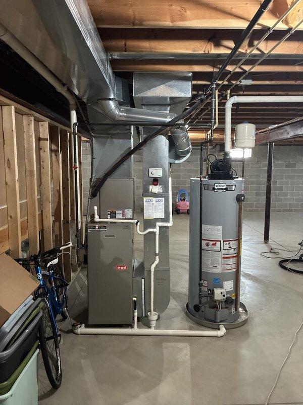 Conducted comprehensive assessment of 17-year-old Bryant furnace system in ranch home basement and identified critical heat exchanger failure requiring immediate replacement. Presented full HVAC system replacement options to address safety concerns and provided detailed estimate for new equipment installation, including proper sizing calculations for the existing ductwork configuration and condensate drainage system. Conducted comprehensive assessment of 17-year-old Bryant furnace system in ranch home basement and identified critical heat exchanger failure requiring immediate replacement. Presented full HVAC system replacement options to address safety concerns and provided detailed estimate for new equipment installation, including proper sizing calculations for the existing ductwork configuration and condensate drainage system.