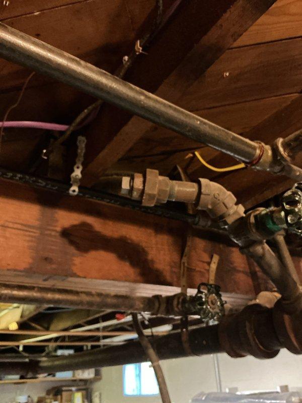 Completed comprehensive heating tune-up and safety inspection on Weil-McLain boiler system for new homeowner. Performed full operational assessment including burner inspection, heat exchanger examination, flue gas analysis, and pressure testing of all piping connections. Verified proper operation of pressure relief valve, circulator pumps, and zone controls. Inspected all copper supply and return piping for leaks and corrosion, noting existing patina on older copper lines consistent with system age. Tested ignition system, flame sensor, and all safety controls to ensure proper shutdown sequences. Confirmed adequate combustion air supply and verified proper venting. System found to be operating within manufacturer specifications with no immediate safety concerns or required repairs at time of inspection. Completed comprehensive heating tune-up and safety inspection on Weil-McLain boiler system for new homeowner. Performed full operational assessment including burner inspection, heat exchanger examination, flue gas analysis, and pressure testing of all piping connections. Verified proper operation of pressure relief valve, circulator pumps, and zone controls. Inspected all copper supply and return piping for leaks and corrosion, noting existing patina on older copper lines consistent with system age. Tested ignition system, flame sensor, and all safety controls to ensure proper shutdown sequences. Confirmed adequate combustion air supply and verified proper venting. System found to be operating within manufacturer specifications with no immediate safety concerns or required repairs at time of inspection.