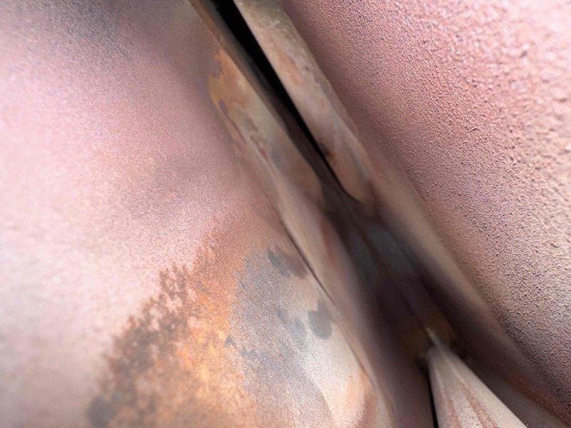 # No Heat Service Call - Rheem HVAC Unit
Responded to no heat complaint on aging Rheem HVAC system showing significant weathering and corrosion. Upon arrival, removed front access panel to inspect internal components. Unit exhibited extensive exterior rust, paint deterioration, and dirt accumulation consistent with 10+ years of operation in basement environment.
Performed thorough diagnostic inspection of internal components including blower assembly, heat exchanger, electrical connections, and copper refrigerant lines. Examined all colored wiring connections, manufacturer specification labels, and mechanical linkages. Noted advanced corrosion on copper piping with substantial oxidation and rust deposits affecting tubing integrity.
Assessed overall system condition and determined extent of wear on critical heating components. Documented unit condition through photographic evidence showing both cabinet deterioration and internal component status.
Unit restored to operational status # No Heat Service Call - Rheem HVAC Unit
Responded to no heat complaint on aging Rheem HVAC system showing significant weathering and corrosion. Upon arrival, removed front access panel to inspect internal components. Unit exhibited extensive exterior rust, paint deterioration, and dirt accumulation consistent with 10+ years of operation in basement environment.
Performed thorough diagnostic inspection of internal components including blower assembly, heat exchanger, electrical connections, and copper refrigerant lines. Examined all colored wiring connections, manufacturer specification labels, and mechanical linkages. Noted advanced corrosion on copper piping with substantial oxidation and rust deposits affecting tubing integrity.
Assessed overall system condition and determined extent of wear on critical heating components. Documented unit condition through photographic evidence showing both cabinet deterioration and internal component status.
Unit restored to operational status