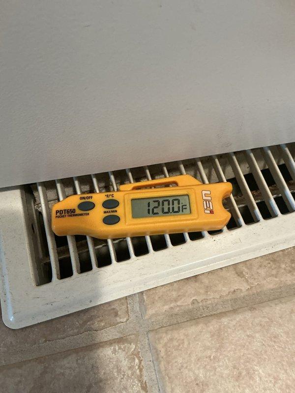 Performed a heating-season tune-up on the HVAC system, inspecting the air handler interior and flexible hose/line connections and noting buildup on the cabinet surfaces. Verified heating operation by measuring supply air temperature at the floor register, which read 120°F, confirming proper heat output. Performed a heating-season tune-up on the HVAC system, inspecting the air handler interior and flexible hose/line connections and noting buildup on the cabinet surfaces. Verified heating operation by measuring supply air temperature at the floor register, which read 120°F, confirming proper heat output.