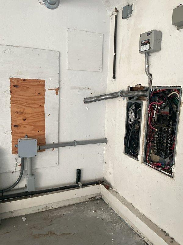 Installed a new transfer switch and three load sheds to integrate the standby generator with the home's electrical system, enabling automatic switching between utility and generator power. Terminated all conductors and routed conduit from the meter enclosure to the service panels, then verified connections for proper operation. Installed a new transfer switch and three load sheds to integrate the standby generator with the home's electrical system, enabling automatic switching between utility and generator power. Terminated all conductors and routed conduit from the meter enclosure to the service panels, then verified connections for proper operation.