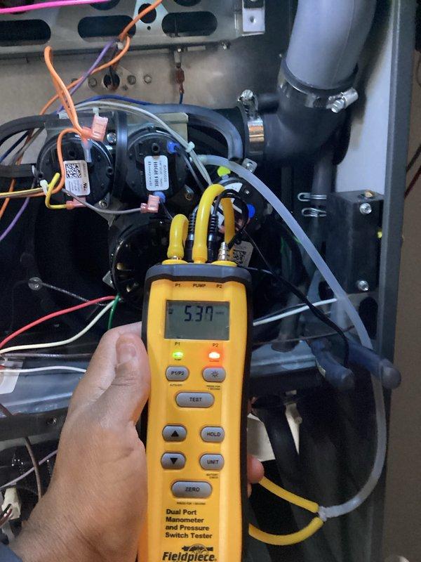 Performed seasonal maintenance on the gas furnace heating system, including electrical diagnostics with a clamp multimeter to verify component amperage and voltage draw. Tested the pressure switches and checked draft and static pressure using a dual-port manometer, then inspected the furnace cabinet interior, finding the wiring, pressure switches, inducer motor housing, and venting intact with only light dust accumulation and no signs of rust, frost, or damage. System operation verified within normal parameters. Performed seasonal maintenance on the gas furnace heating system, including electrical diagnostics with a clamp multimeter to verify component amperage and voltage draw. Tested the pressure switches and checked draft and static pressure using a dual-port manometer, then inspected the furnace cabinet interior, finding the wiring, pressure switches, inducer motor housing, and venting intact with only light dust accumulation and no signs of rust, frost, or damage. System operation verified within normal parameters.