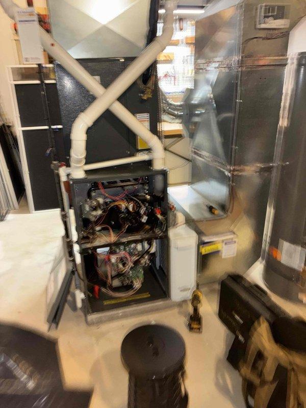Performed scheduled maintenance on the gas furnace, including inspection of the control board, relays, and low-voltage and line-voltage wiring connections with the unit's access panels removed. Verified electrical operation using a digital clamp meter to measure amperage draw on the system's wiring and confirm components were operating within normal parameters. Inspected the condensate/venting PVC piping, ductwork connections, and surrounding unit cabinet, with no signs of corrosion, frost, or visible damage noted. Performed scheduled maintenance on the gas furnace, including inspection of the control board, relays, and low-voltage and line-voltage wiring connections with the unit's access panels removed. Verified electrical operation using a digital clamp meter to measure amperage draw on the system's wiring and confirm components were operating within normal parameters. Inspected the condensate/venting PVC piping, ductwork connections, and surrounding unit cabinet, with no signs of corrosion, frost, or visible damage noted.