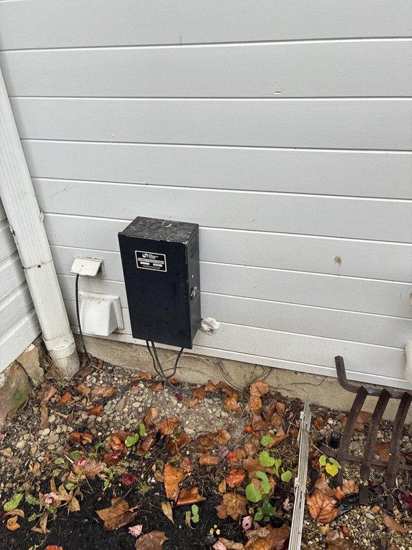Performed an on-site evaluation for replacement of an existing 33-year-old furnace, assessing the unit, the connected galvanized supply ductwork, and the exterior electrical service components. Documented the condition of the ductwork, including taped and mastic-sealed seams, a patched section, and minor surface corrosion, along with the exterior electrical enclosure and outlet locations, to determine the scope for a replacement installation. Performed an on-site evaluation for replacement of an existing 33-year-old furnace, assessing the unit, the connected galvanized supply ductwork, and the exterior electrical service components. Documented the condition of the ductwork, including taped and mastic-sealed seams, a patched section, and minor surface corrosion, along with the exterior electrical enclosure and outlet locations, to determine the scope for a replacement installation.