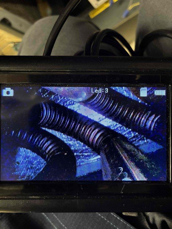 Performed scheduled heating maintenance on three furnace systems, including visual inspection of heat exchanger and coil components with a borescope camera and electrical testing of system components with a true RMS clamp meter. Noted surface rust on a metal component in one unit; systems were checked for proper operation and recommended for continued monitoring under the recurring maintenance plan. Performed scheduled heating maintenance on three furnace systems, including visual inspection of heat exchanger and coil components with a borescope camera and electrical testing of system components with a true RMS clamp meter. Noted surface rust on a metal component in one unit; systems were checked for proper operation and recommended for continued monitoring under the recurring maintenance plan.