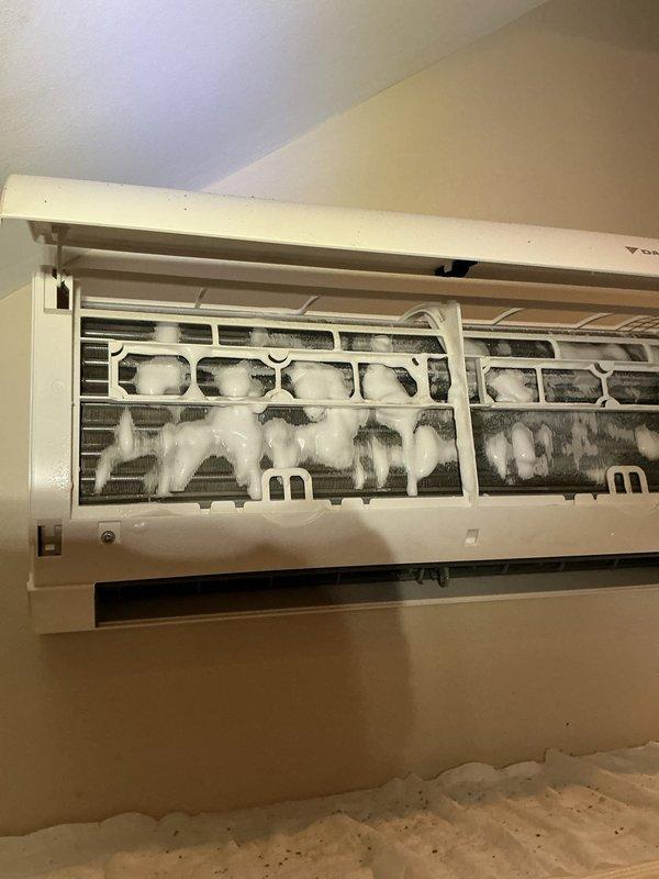 Responded to a customer report of suspected mold growth inside a ductless mini-split indoor unit. Inspection confirmed dirt and debris buildup on the louver assembly, filter area, and evaporator coil, and the coil and plastic frame were treated with foaming coil cleaner as part of a thorough cleaning, with a drop cloth protecting the surrounding area. The unit was cleaned to restore sanitary operation and improve indoor air quality. Responded to a customer report of suspected mold growth inside a ductless mini-split indoor unit. Inspection confirmed dirt and debris buildup on the louver assembly, filter area, and evaporator coil, and the coil and plastic frame were treated with foaming coil cleaner as part of a thorough cleaning, with a drop cloth protecting the surrounding area. The unit was cleaned to restore sanitary operation and improve indoor air quality.