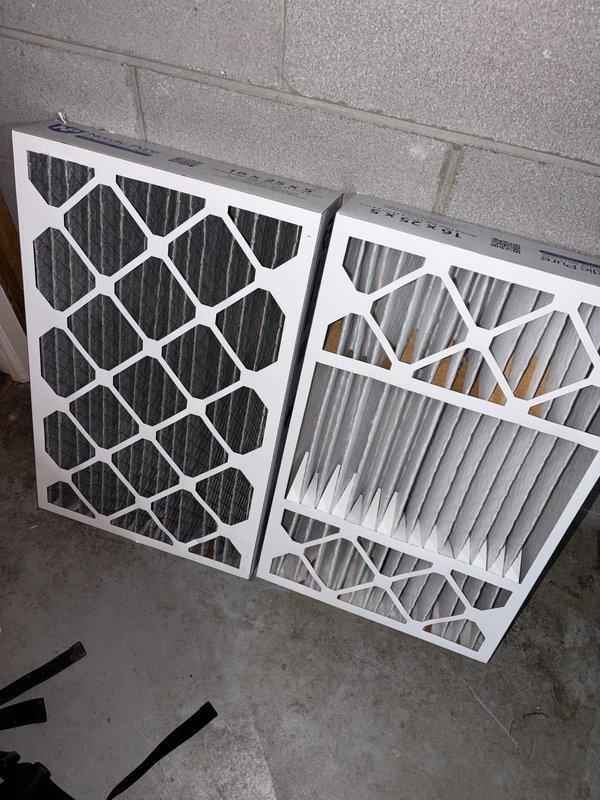 Performed seasonal heating system maintenance on a 10+ year old unit, including inspection of the filtration section and removal of the heavily soiled pleated filters. Installed new 16x25x5 high-efficiency pleated filters, verifying proper seating and fit within the filter slot to ensure adequate airflow and filtration. Performed seasonal heating system maintenance on a 10+ year old unit, including inspection of the filtration section and removal of the heavily soiled pleated filters. Installed new 16x25x5 high-efficiency pleated filters, verifying proper seating and fit within the filter slot to ensure adequate airflow and filtration.