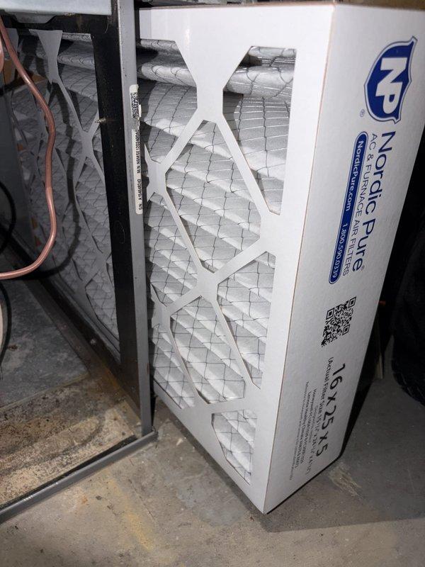 Performed seasonal heating system maintenance on a 10+ year old unit, including inspection of the filtration section and removal of the heavily soiled pleated filters. Installed new 16x25x5 high-efficiency pleated filters, verifying proper seating and fit within the filter slot to ensure adequate airflow and filtration. Performed seasonal heating system maintenance on a 10+ year old unit, including inspection of the filtration section and removal of the heavily soiled pleated filters. Installed new 16x25x5 high-efficiency pleated filters, verifying proper seating and fit within the filter slot to ensure adequate airflow and filtration.