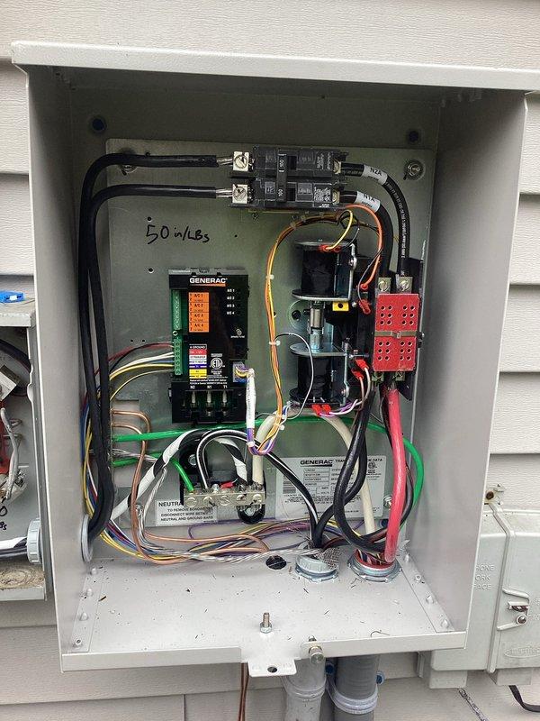 Installed a 24kW Generac standby generator with an automatic transfer switch on the exterior wall, running #2 THHN aluminum feeder conductors in conduit with Unistrut support. Terminated and torqued all connections to manufacturer specifications, connected the control module and low-voltage wiring, bonded the neutral and ground, and completed the gas line connection from the existing meter assembly. Installed a 24kW Generac standby generator with an automatic transfer switch on the exterior wall, running #2 THHN aluminum feeder conductors in conduit with Unistrut support. Terminated and torqued all connections to manufacturer specifications, connected the control module and low-voltage wiring, bonded the neutral and ground, and completed the gas line connection from the existing meter assembly.