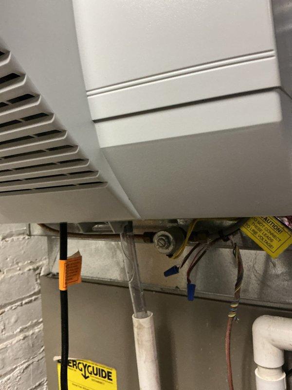 Responded to a non-functioning whole-house humidifier complaint and inspected the Aprilaire unit mounted on the supply plenum, including the water supply connection, drain line, and electrical wiring. Documented loose, exposed low-voltage wiring and connections at the unit for evaluation and correction, and verified the casing and mounting were clean and free of rust or damage. Responded to a non-functioning whole-house humidifier complaint and inspected the Aprilaire unit mounted on the supply plenum, including the water supply connection, drain line, and electrical wiring. Documented loose, exposed low-voltage wiring and connections at the unit for evaluation and correction, and verified the casing and mounting were clean and free of rust or damage.