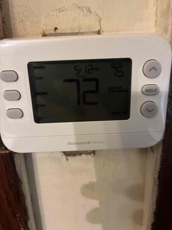 Responded to callback for a furnace not producing heat following a prior repair. Inspected the system and verified thermostat operation, confirming the Honeywell digital thermostat was set to Heat mode at 75°F with an active call for heat and the heat-on status displayed. Furnace is now operating and responding to thermostat demand. Responded to callback for a furnace not producing heat following a prior repair. Inspected the system and verified thermostat operation, confirming the Honeywell digital thermostat was set to Heat mode at 75°F with an active call for heat and the heat-on status displayed. Furnace is now operating and responding to thermostat demand.