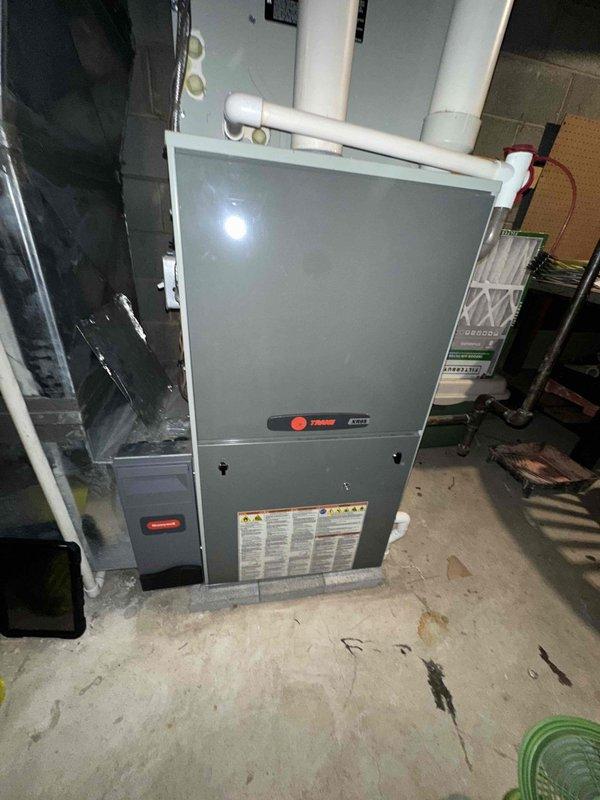 Performed annual heating tune-up on a Trane XR95 high-efficiency gas furnace, including inspection of the cabinet, PVC intake/exhaust piping, and controls. Accessed and inspected the blower assembly, where light dust accumulation was noted on the galvanized blower wheel and housing, and cleaned the components to restore proper airflow. Verified the system was operating normally upon completion. Performed annual heating tune-up on a Trane XR95 high-efficiency gas furnace, including inspection of the cabinet, PVC intake/exhaust piping, and controls. Accessed and inspected the blower assembly, where light dust accumulation was noted on the galvanized blower wheel and housing, and cleaned the components to restore proper airflow. Verified the system was operating normally upon completion.