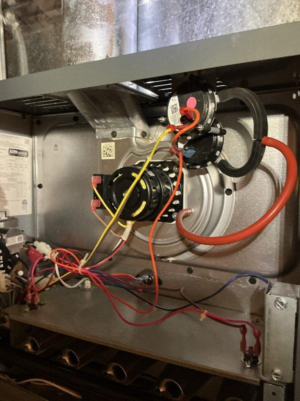 Performed scheduled heating maintenance on a gas furnace, inspecting the inducer motor, pressure switches, silicone and rubber hoses, wiring harness, and burner assembly with the access panel removed. Components showed light dust accumulation but no signs of rust, frost, or breakage, and the system was found in good operating condition. Reviewed the importance of blower wheel cleanliness and regular filter replacement to maintain efficiency, airflow, and indoor air quality. Performed scheduled heating maintenance on a gas furnace, inspecting the inducer motor, pressure switches, silicone and rubber hoses, wiring harness, and burner assembly with the access panel removed. Components showed light dust accumulation but no signs of rust, frost, or breakage, and the system was found in good operating condition. Reviewed the importance of blower wheel cleanliness and regular filter replacement to maintain efficiency, airflow, and indoor air quality.