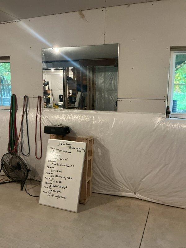 Aurora, OH - Assessed the basement for an electrical estimate covering outlet replacement and fixture changes, noting existing wall conditions, including bare drywall and plastic sheeting over the lower walls. Evaluated device locations and clearances in the unfinished space, including areas near floor-level equipment and cord routing, to determine scope and requirements for the new outlets and fixtures. Aurora, OH - Assessed the basement for an electrical estimate covering outlet replacement and fixture changes, noting existing wall conditions, including bare drywall and plastic sheeting over the lower walls. Evaluated device locations and clearances in the unfinished space, including areas near floor-level equipment and cord routing, to determine scope and requirements for the new outlets and fixtures.
