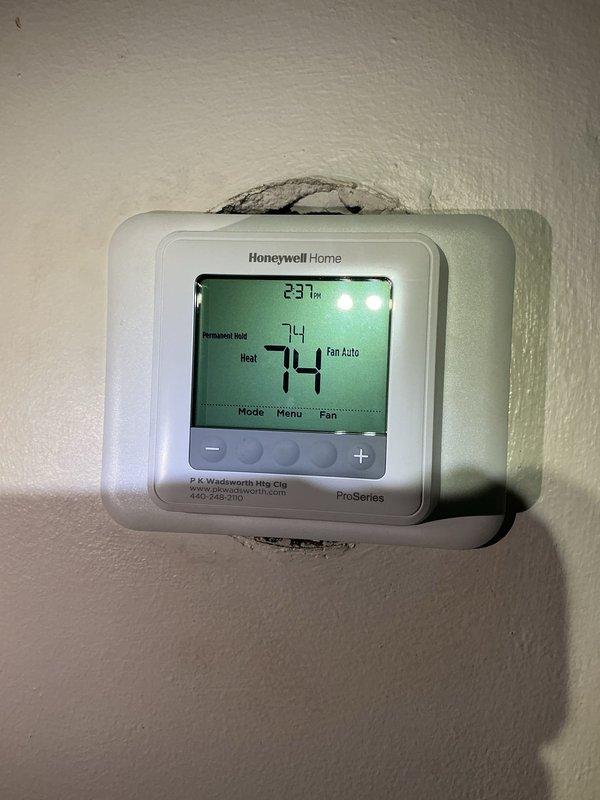 Replaced a failed radiator valve handwheel (knob) on the cast-iron steam/hot water radiator at the customer's request, restoring manual operation of the valve. The valve stem, packing nut, and union fitting were inspected, and the existing valve assembly was left in service. System operation was verified, and the thermostat was observed operating normally in heat mode. Replaced a failed radiator valve handwheel (knob) on the cast-iron steam/hot water radiator at the customer's request, restoring manual operation of the valve. The valve stem, packing nut, and union fitting were inspected, and the existing valve assembly was left in service. System operation was verified, and the thermostat was observed operating normally in heat mode.