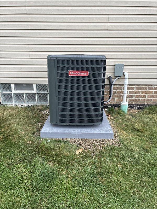 Installed a complete high-efficiency HVAC system consisting of a 96% AFUE gas furnace, a Goodman air conditioning condenser, and a whole-home humidifier. The condenser was set level on a composite pad with a new insulated refrigerant line set, flexible electrical conduit, a fused disconnect, and a PVC condensate drain routed to code. The system was verified for proper operation, and the installation was left clean with no visible damage. Installed a complete high-efficiency HVAC system consisting of a 96% AFUE gas furnace, a Goodman air conditioning condenser, and a whole-home humidifier. The condenser was set level on a composite pad with a new insulated refrigerant line set, flexible electrical conduit, a fused disconnect, and a PVC condensate drain routed to code. The system was verified for proper operation, and the installation was left clean with no visible damage.