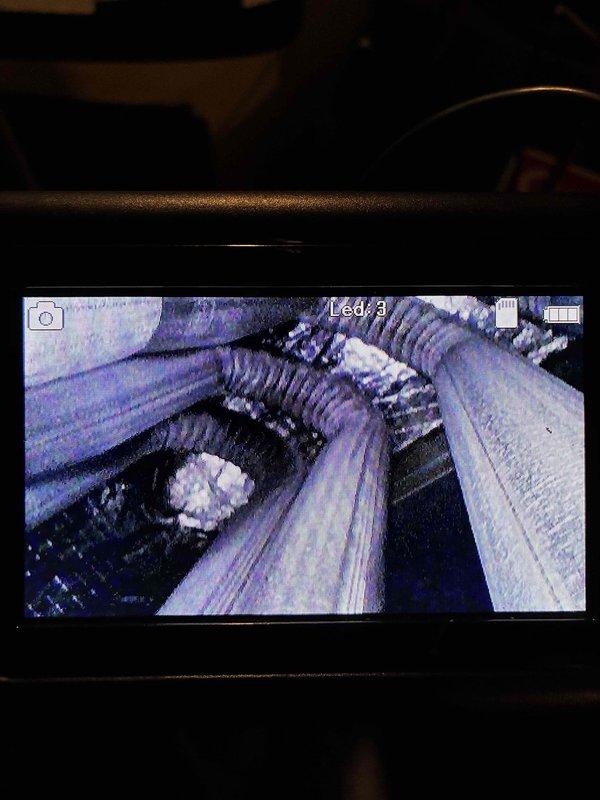 Performed scheduled heating maintenance on the furnace, including a visual inspection of the system and surrounding ductwork using a borescope camera. Inspected the supply duct runs, flexible duct, and insulation, and examined an access opening where a frosted or insulation-like buildup was observed, documenting findings with photos for the service record. The system was left operational at the completion of the recurring maintenance visit. Performed scheduled heating maintenance on the furnace, including a visual inspection of the system and surrounding ductwork using a borescope camera. Inspected the supply duct runs, flexible duct, and insulation, and examined an access opening where a frosted or insulation-like buildup was observed, documenting findings with photos for the service record. The system was left operational at the completion of the recurring maintenance visit.