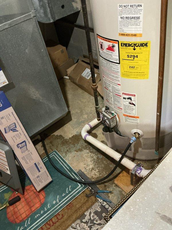 Performed a seasonal heating tune-up, inspecting the furnace cabinet, ductwork, and filter housing. Removed and inspected the pleated air filter, which showed discoloration and debris loading along the pleats, and recommended replacement to maintain proper airflow and system efficiency. Noted moisture staining on the floor near the adjacent water heater and condensate piping, and advised monitoring the area for a possible leak. Performed a seasonal heating tune-up, inspecting the furnace cabinet, ductwork, and filter housing. Removed and inspected the pleated air filter, which showed discoloration and debris loading along the pleats, and recommended replacement to maintain proper airflow and system efficiency. Noted moisture staining on the floor near the adjacent water heater and condensate piping, and advised monitoring the area for a possible leak.