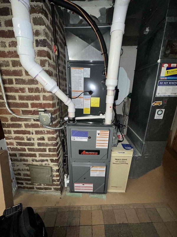 Performed annual maintenance tune-up on a 2-year-old Amana gas furnace with a Space-Gard air cleaner. Inspected the unit and verified supply air temperature at the duct using a digital thermometer, confirming proper heating operation. The system is functioning properly, with no visible rust, frost, or damage observed. Performed annual maintenance tune-up on a 2-year-old Amana gas furnace with a Space-Gard air cleaner. Inspected the unit and verified supply air temperature at the duct using a digital thermometer, confirming proper heating operation. The system is functioning properly, with no visible rust, frost, or damage observed.