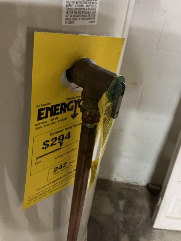 Performed a courtesy plumbing inspection of the natural gas water heater, including the temperature and pressure relief valve with copper discharge line, the copper supply piping and brass shut-off valve, the thermal expansion tank, and the galvanized flue vent connection at the draft hood. Components were found in place and properly configured, with light patina and residue noted at copper joints but no active leaks observed. Performed a courtesy plumbing inspection of the natural gas water heater, including the temperature and pressure relief valve with copper discharge line, the copper supply piping and brass shut-off valve, the thermal expansion tank, and the galvanized flue vent connection at the draft hood. Components were found in place and properly configured, with light patina and residue noted at copper joints but no active leaks observed.