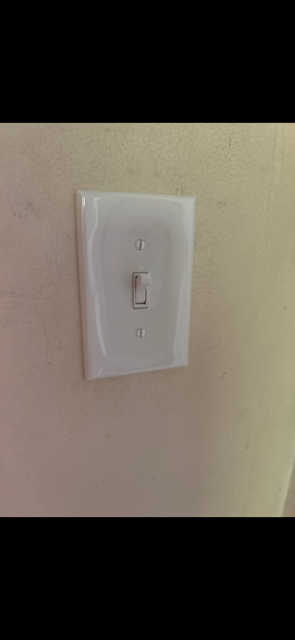 Diagnostic service of two light switches in garage - replaced switches and cover plates. Reconnected attic fan above bedroom.
