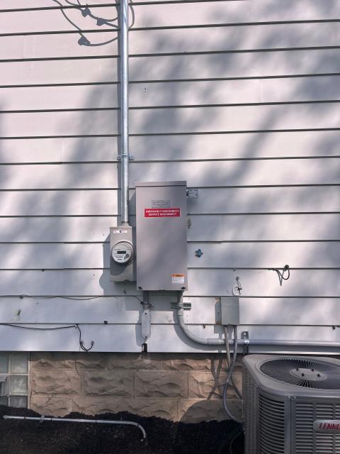 We installed a 13 kilowatt generator, upgraded the 200 amp panel, and enhanced the overhead service. We also re-installed outlets, switches, and trim plates throughout the house, and added a new 15 amp circuit.