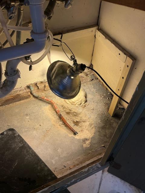 Repaired leaking copper pipe under concrete slab 