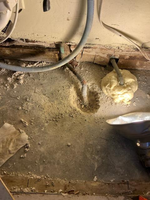 Repaired leaking copper pipe under concrete slab 