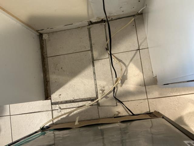 I replaced the refrigerator’s icemaker line through the cabinets and connected it underneath the kitchen sink.