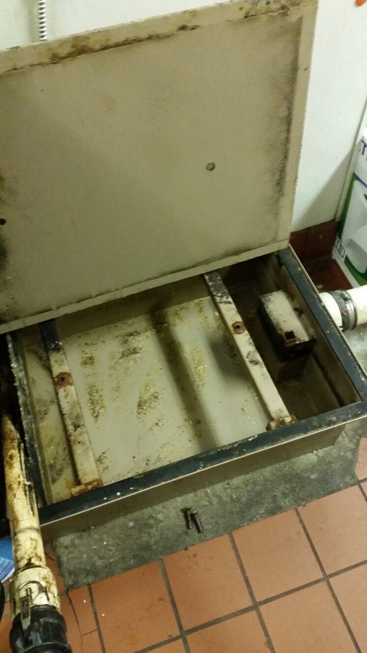 Pumped out grease trap