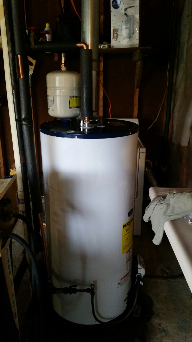 Installed propane water heater with expansion tank
