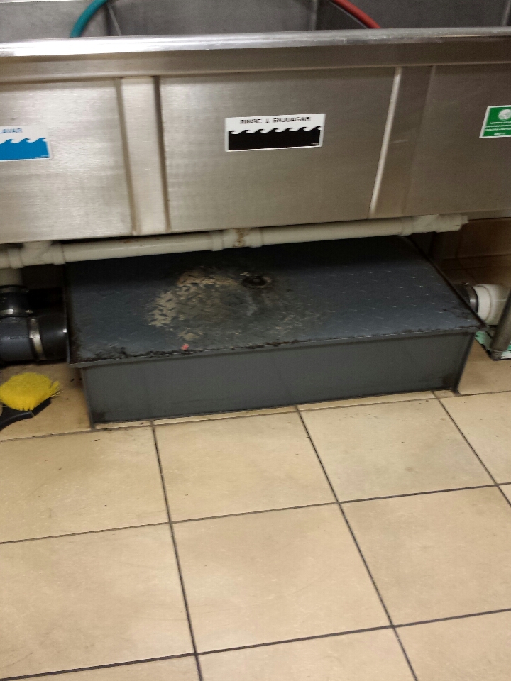 pumped / cleaned inside grease trap
