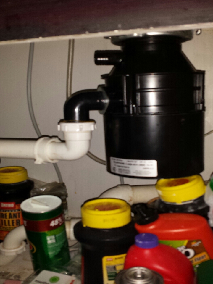 Installed garbage disposal and checked plumbing drains