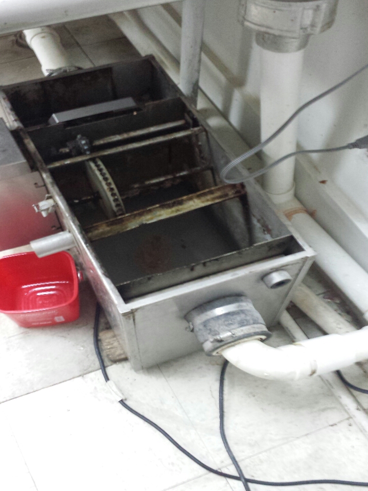 pumped and cleaned grease trap