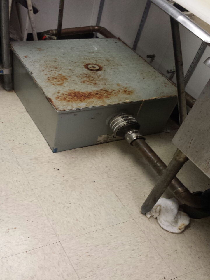 Pumped out grease trap