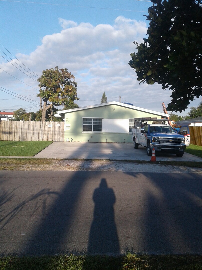 Dania Beach, FL - Shingle roof repair in the city of Dania Florida this repairs being done by Earl W Johnston roofing company Tony is the supervisor in charge Dania Beach, FL - Shingle roof repair in the city of Dania Florida this repairs being done by Earl W Johnston roofing company Tony is the supervisor in charge