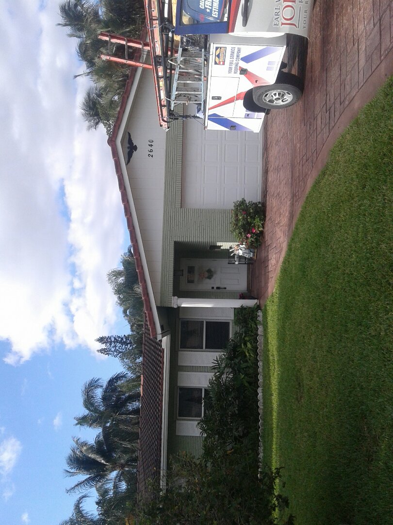 Pompano Beach, FL - Roof tile repair in the city of Pompano Beach Florida just repairs being done by Earl W Johnston roofing company Tony and Regis are you repair technicians Pompano Beach, FL - Roof tile repair in the city of Pompano Beach Florida just repairs being done by Earl W Johnston roofing company Tony and Regis are you repair technicians